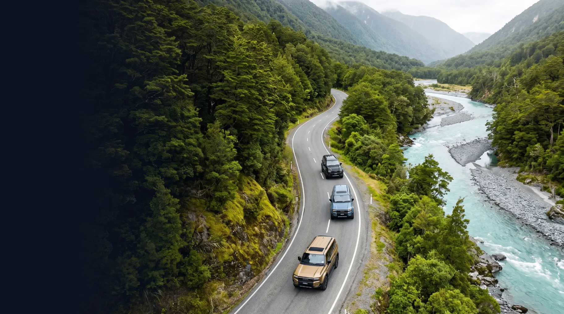 Convoy on a South Island road beside a turquoise river